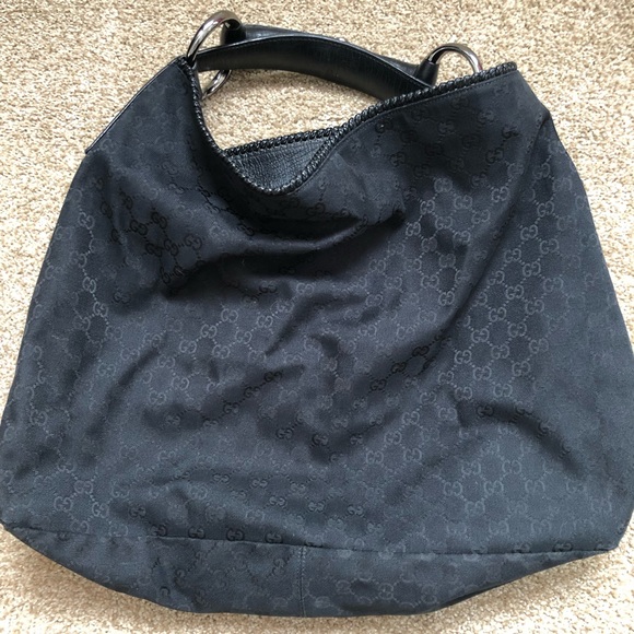 Gucci Black Leather Horsebit Hobo Bag with Silver Hardware.